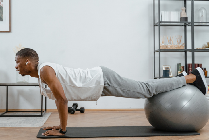Pexels | MART PRODUCTION | The Swiss ball circle, also recognized as a stability ball circle, transforms the conventional plank by incorporating controlled movements.